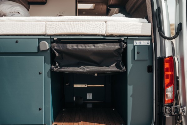 Storage bag under rear bed