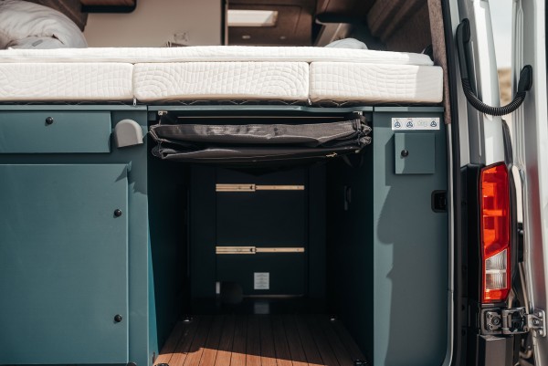 Storage bag under rear bed